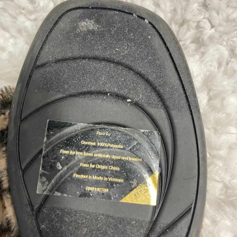 Kate Spade Sandy leopard print faux fur slippers with gold tone accent size 10B